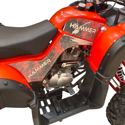 Close-up of Four Stroke 250cc petrol engine and rider footrest
