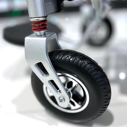 CN-6012 remote control enabled electric wheel chair, front tire view