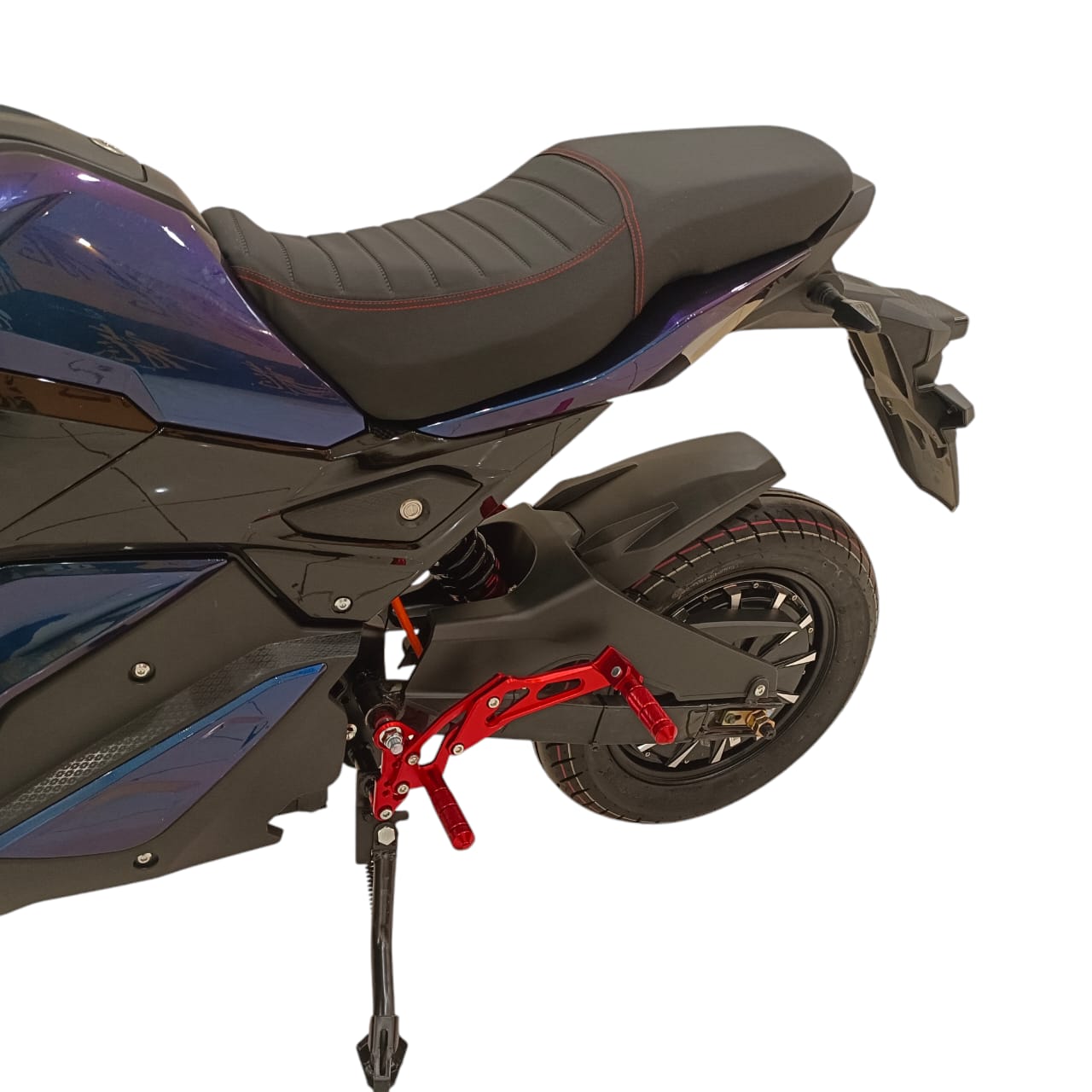 Rear suspension and passenger footrest assembly.