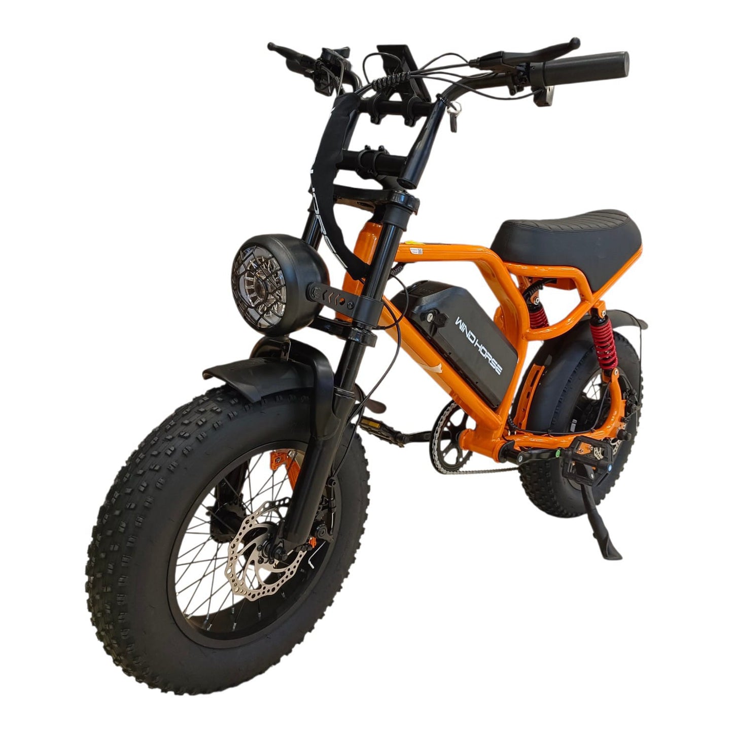 WindHorse V8 Mini orange multi-terrain electric bike front angle with large LED headlight and fat tires