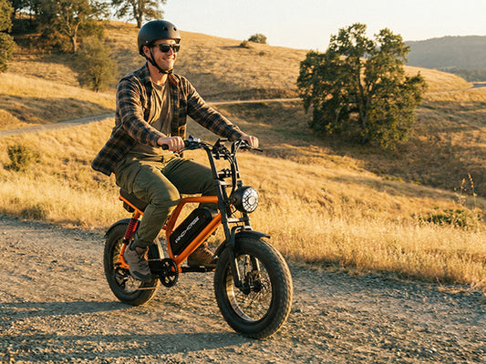 WindHorse V8 Mini fat tire electric bike ridden on an outdoor multi-terrain trail