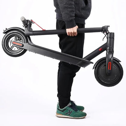 M365 Foldable E-Scooter lightweight folding frame being carried by hand.