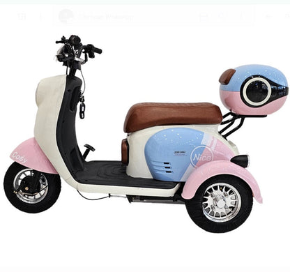 CM-03 Tri-Wheel Two Seater Electric Mobility Bike side profile showing baby seat, rear luggage box and 14-inch tyres
